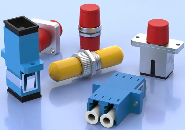 Several fiber adapters and couplers in different shapes are arranged together to introduce detachable fiber connections.