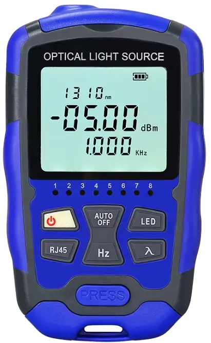 Handheld optical light source shows a 1310 nm reading and output value on its front display.