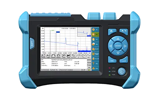 Handheld OTDR shows a fiber trace graph on the screen with physical control buttons on the right side.